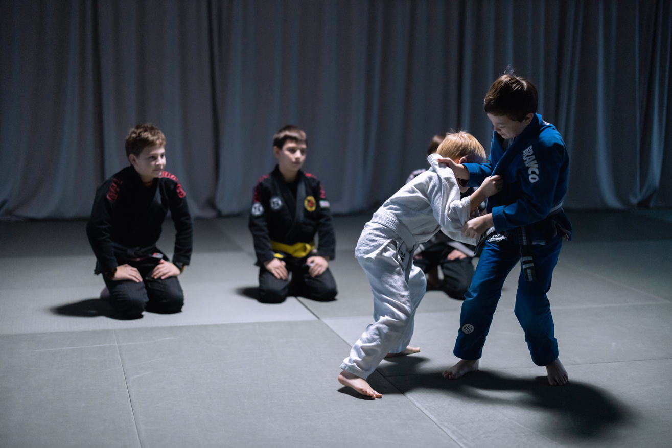 Boys Sparring on Black Mat